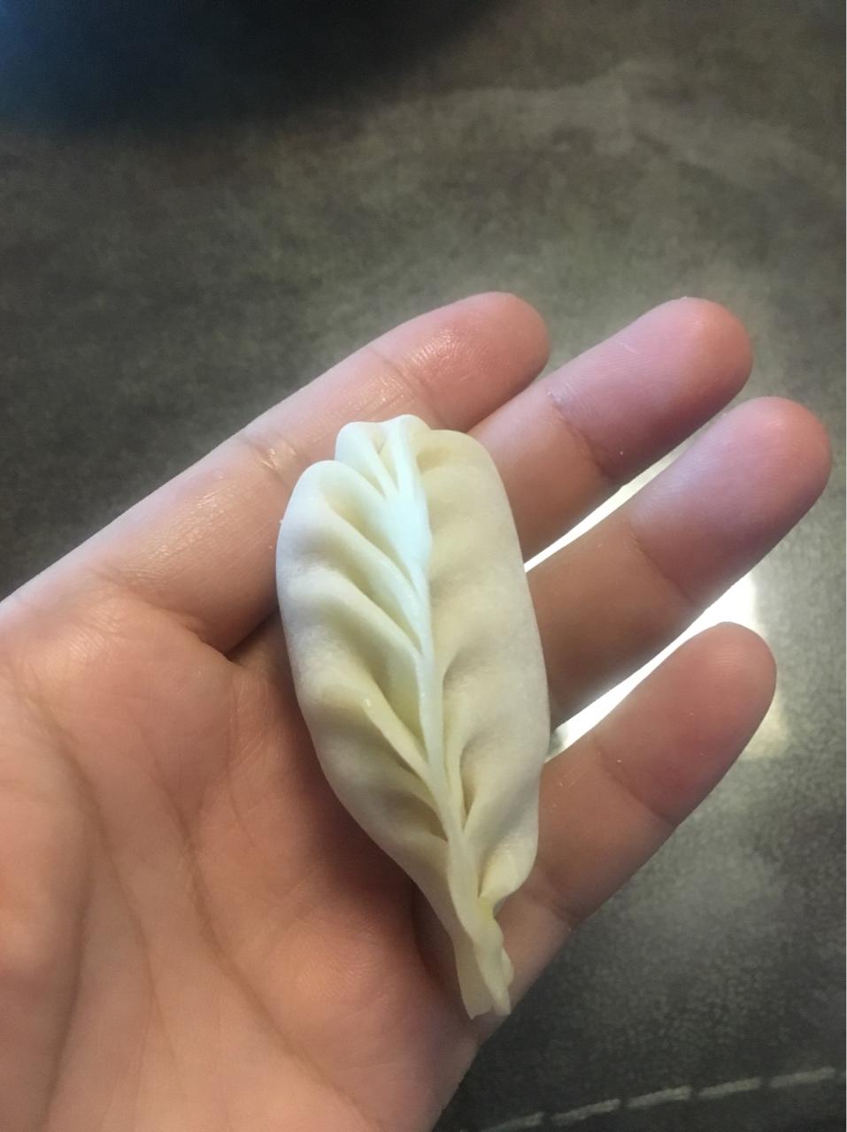 奥贝儿做的弯柳叶包子包法