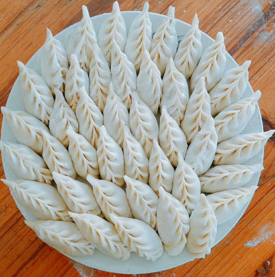 手机用户1570_748l做的西葫芦鸡蛋馅儿饺子(内有柳叶饺子手法视频)