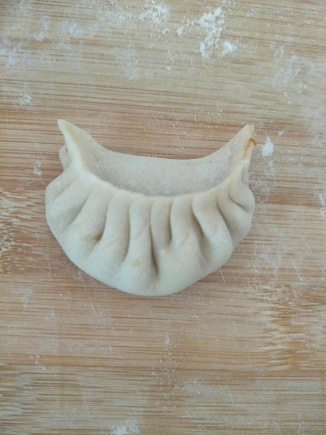 手机用户9897_8ibx做的饺子的包法
