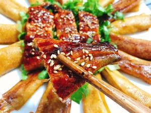 鳗鱼豆腐片金针菇的做法 步骤7