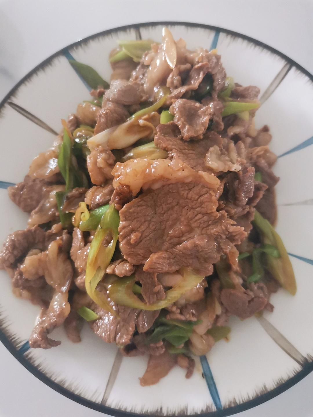 炒了20多年的葱爆羊肉