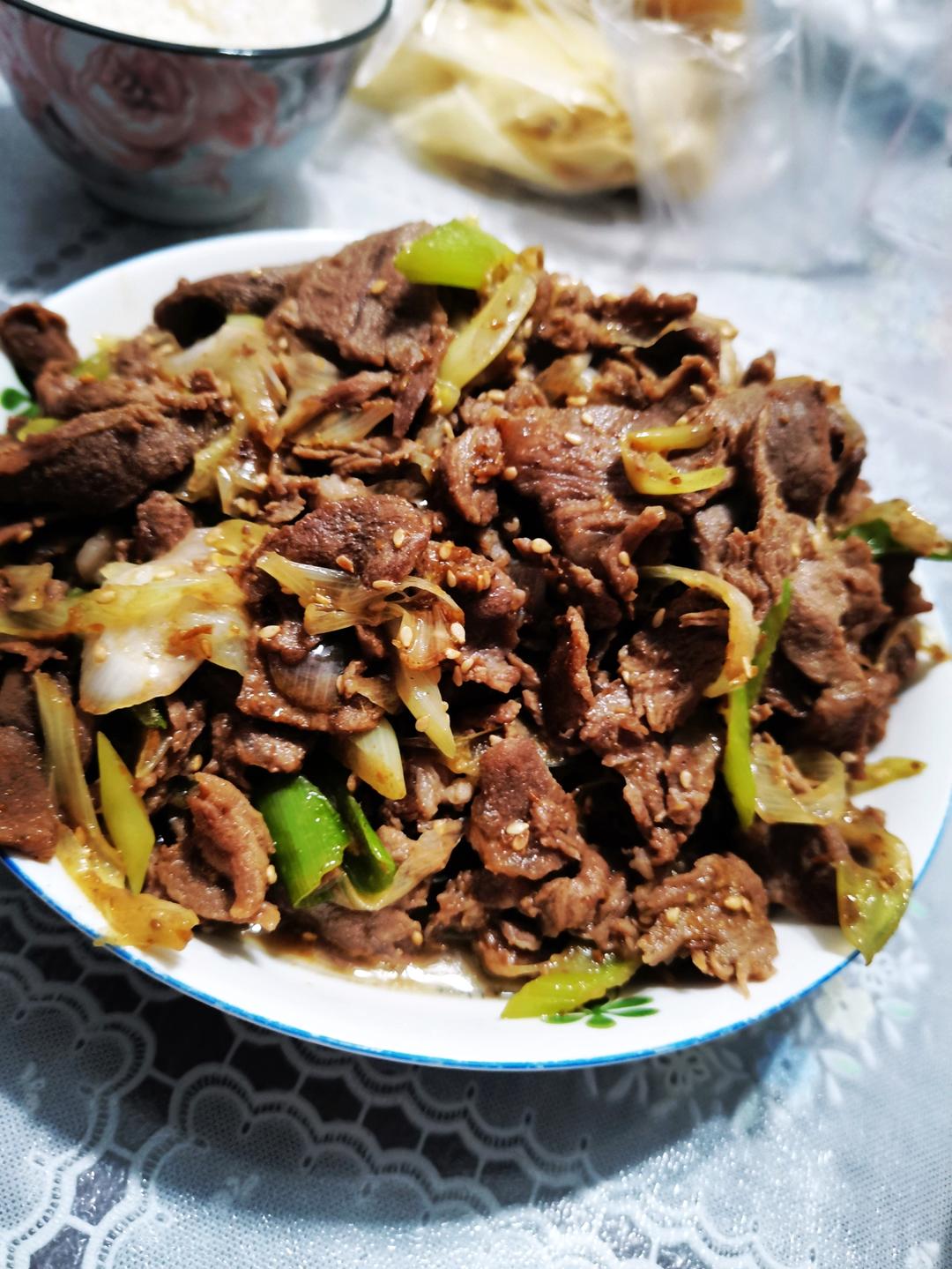炒了20多年的葱爆羊肉