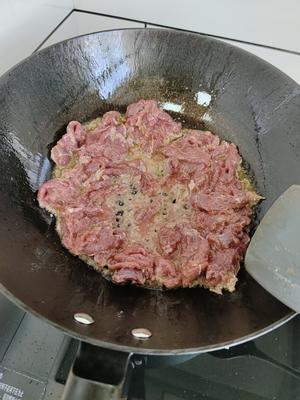 酸菜炒牛肉的做法 步骤7