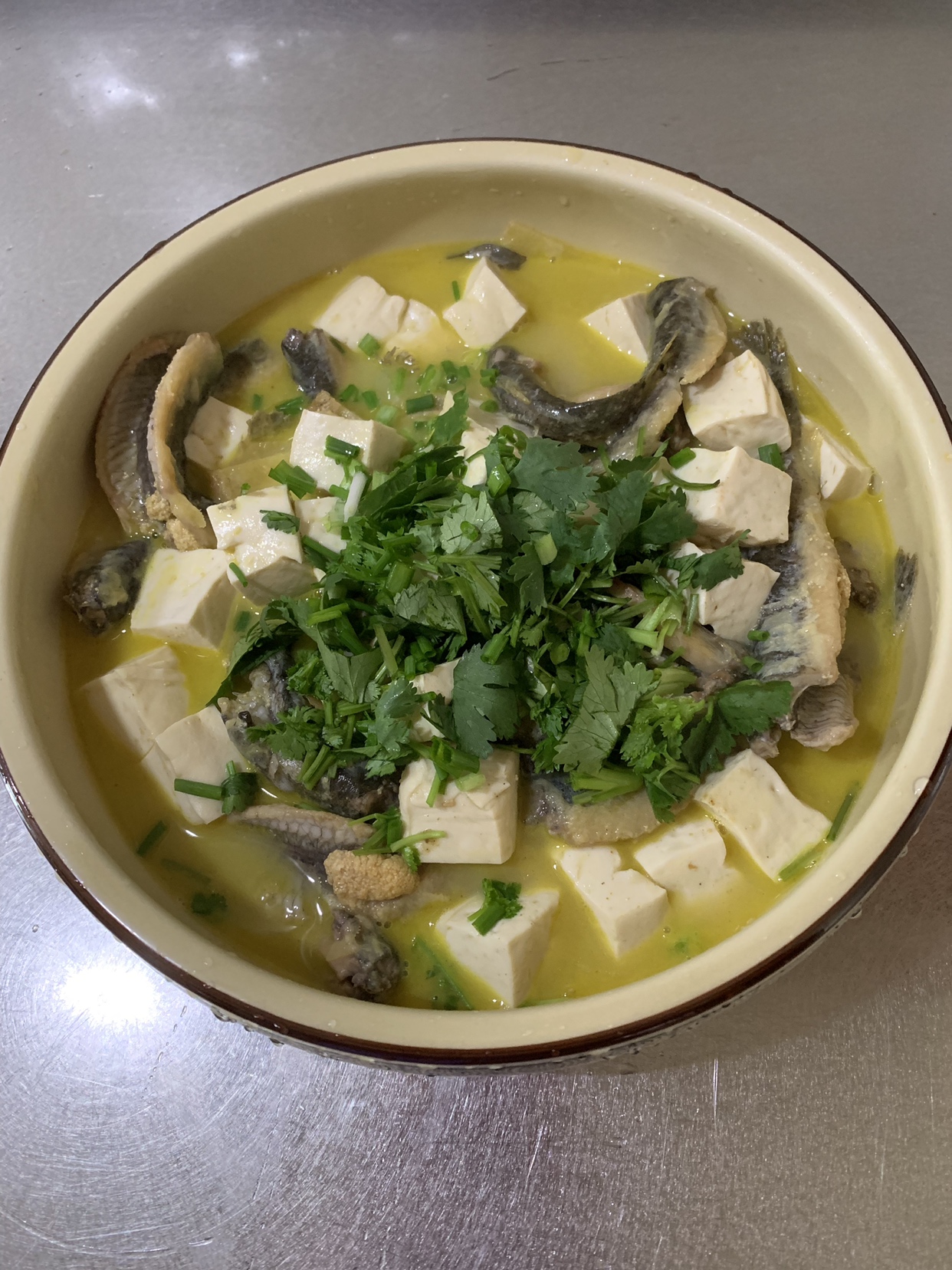 泥鳅炖豆腐的做法 步骤4