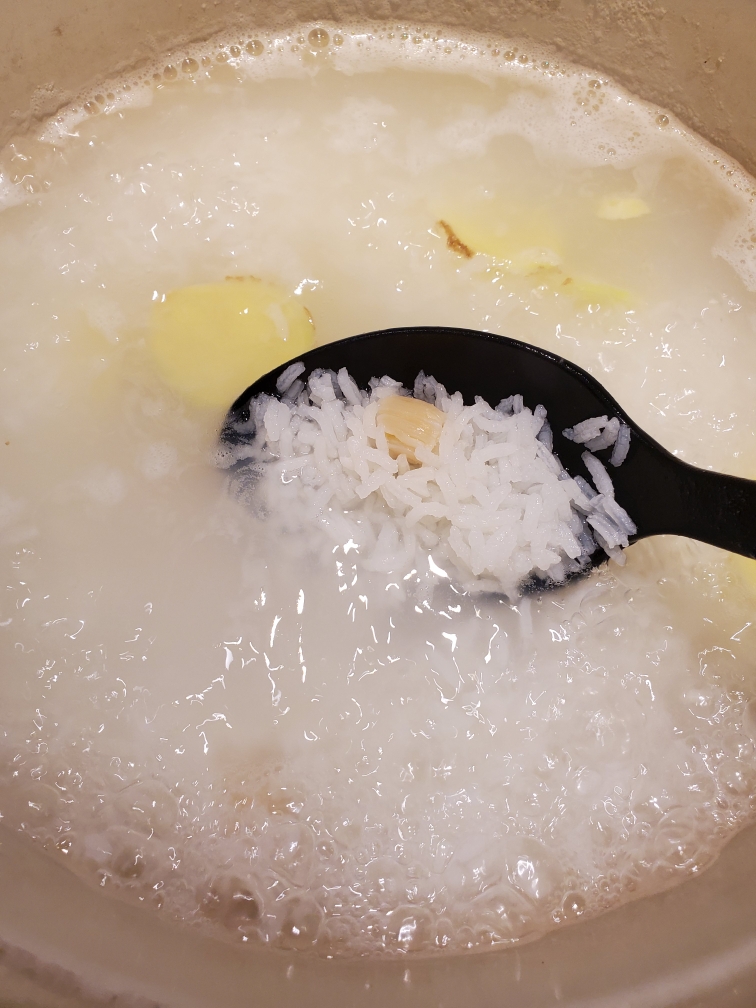 快速版 龙虾鲍鱼鸡汤粥的做法 步骤2
