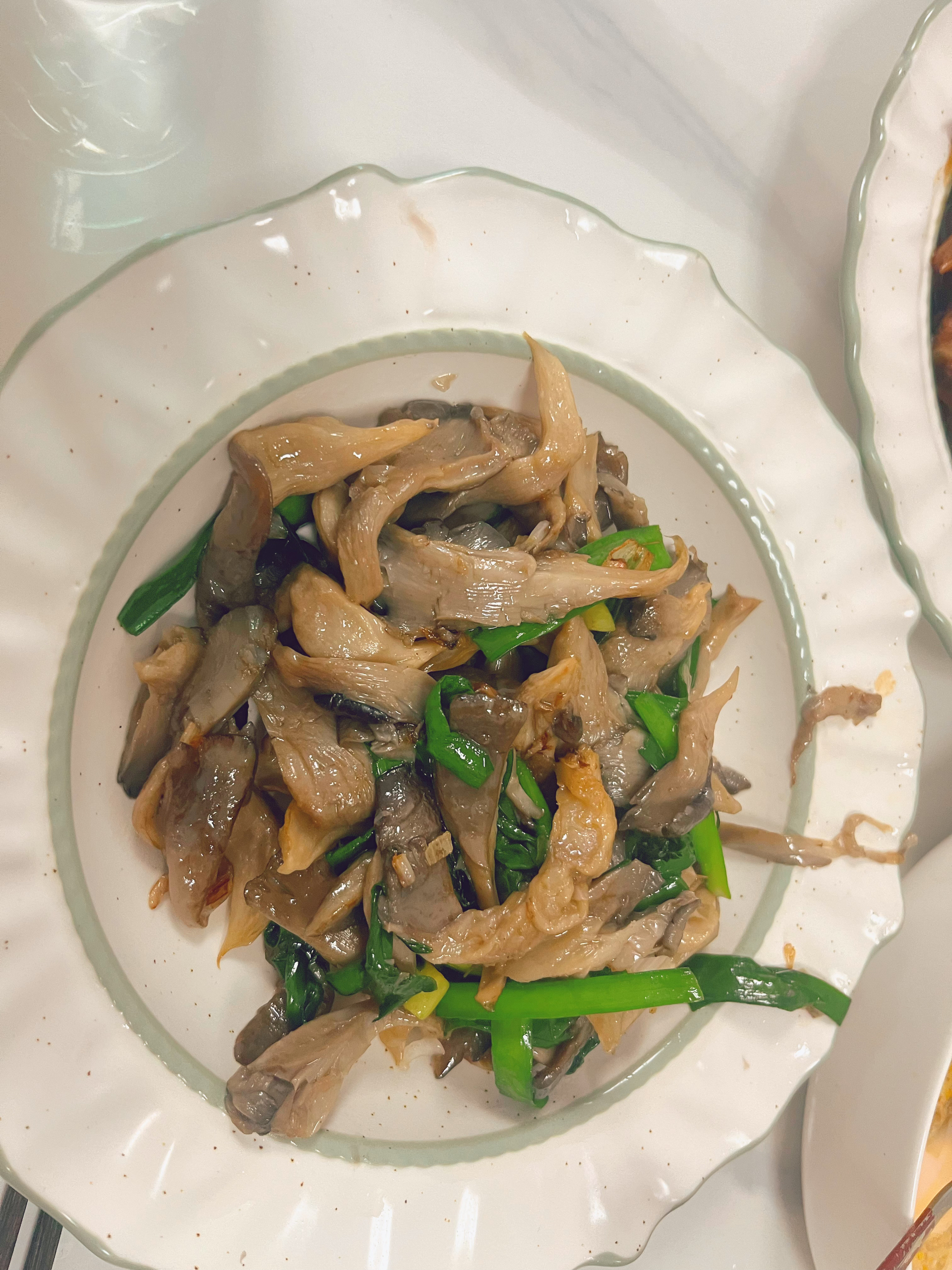 韭菜炒平菇的做法