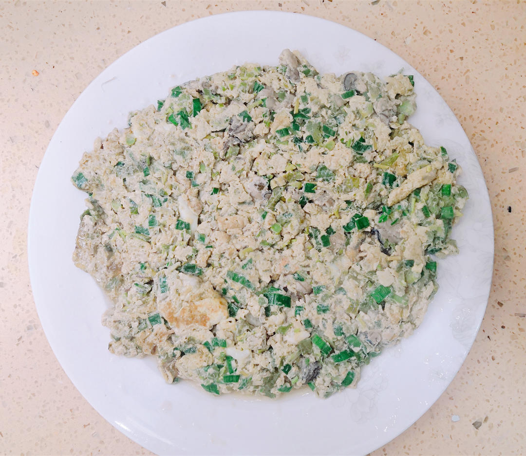 牡蛎香椿煎鸡蛋的做法 步骤5