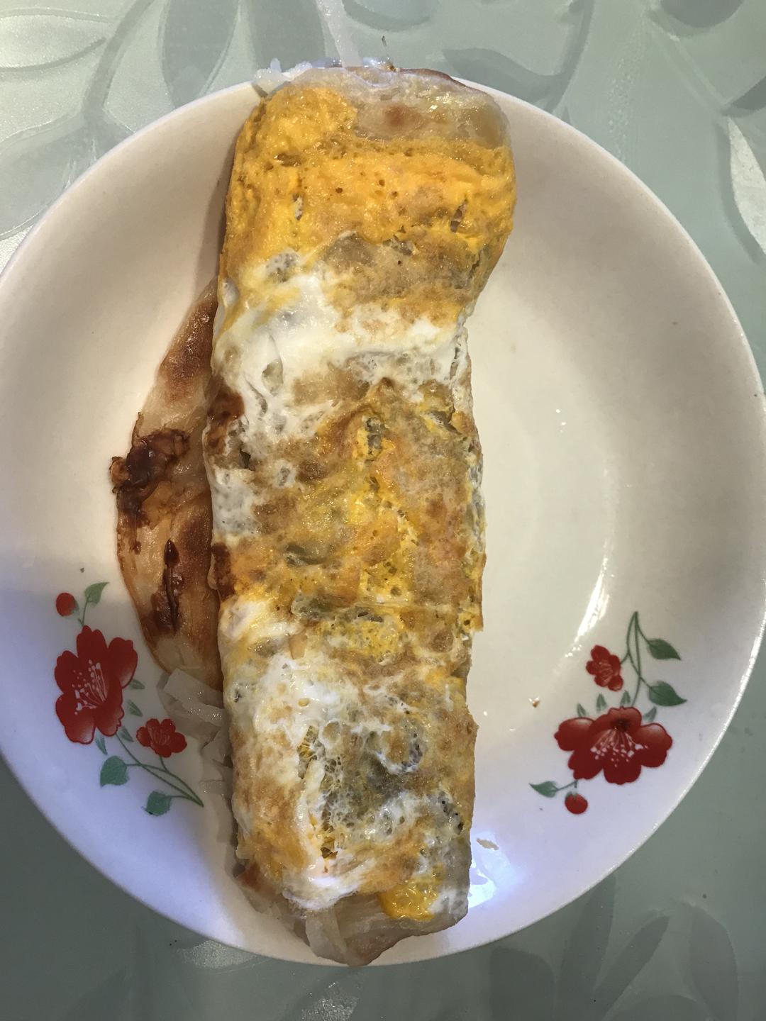 手抓饼鸡蛋土豆丝的做法