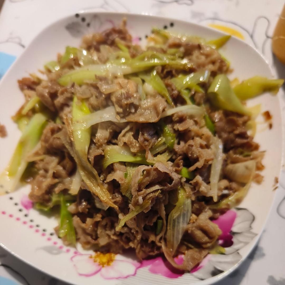 炒了20多年的葱爆羊肉