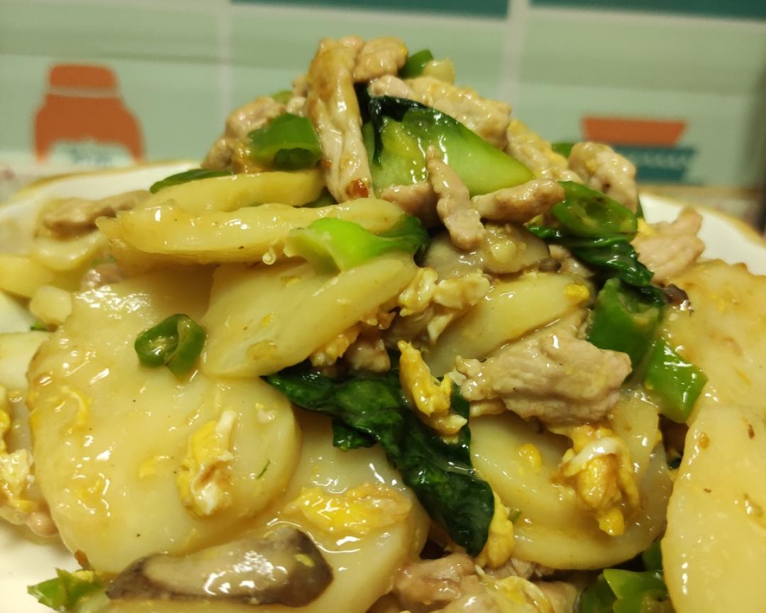 青椒肉丝炒年糕的做法