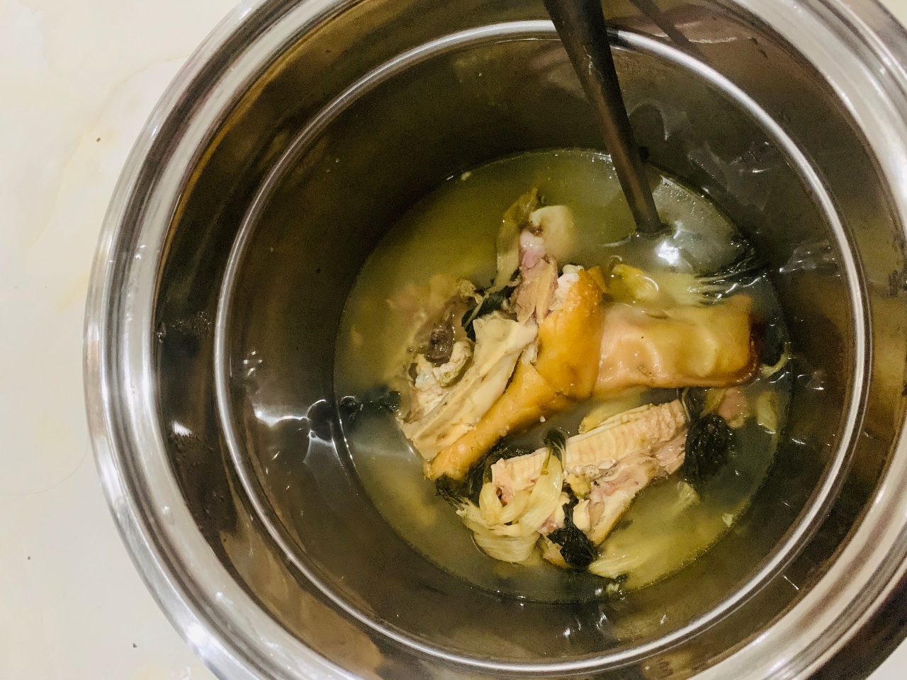 烧猪骨菜干汤的做法