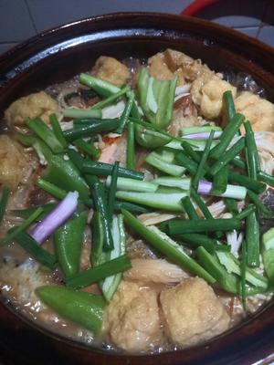 家庭式三文鱼砂锅鱼头煲的做法 步骤7