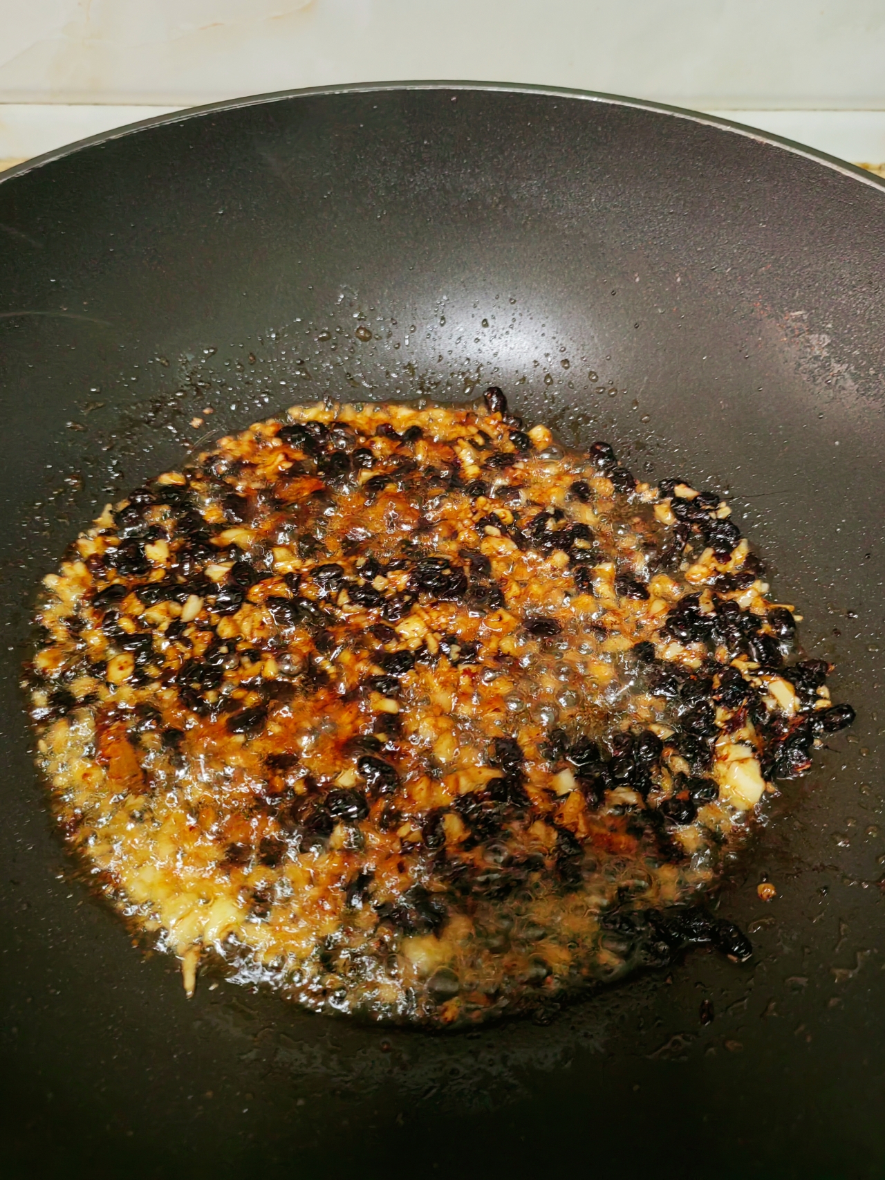 豆豉鲮鱼炒油麦菜的做法 步骤7