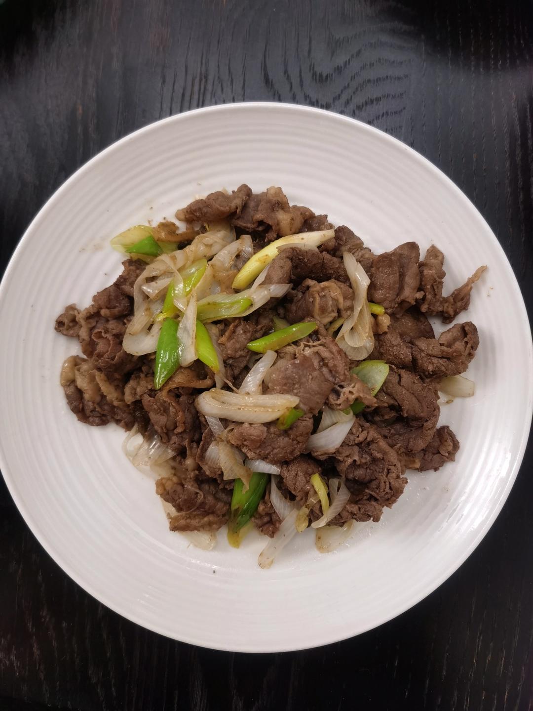 炒了20多年的葱爆羊肉