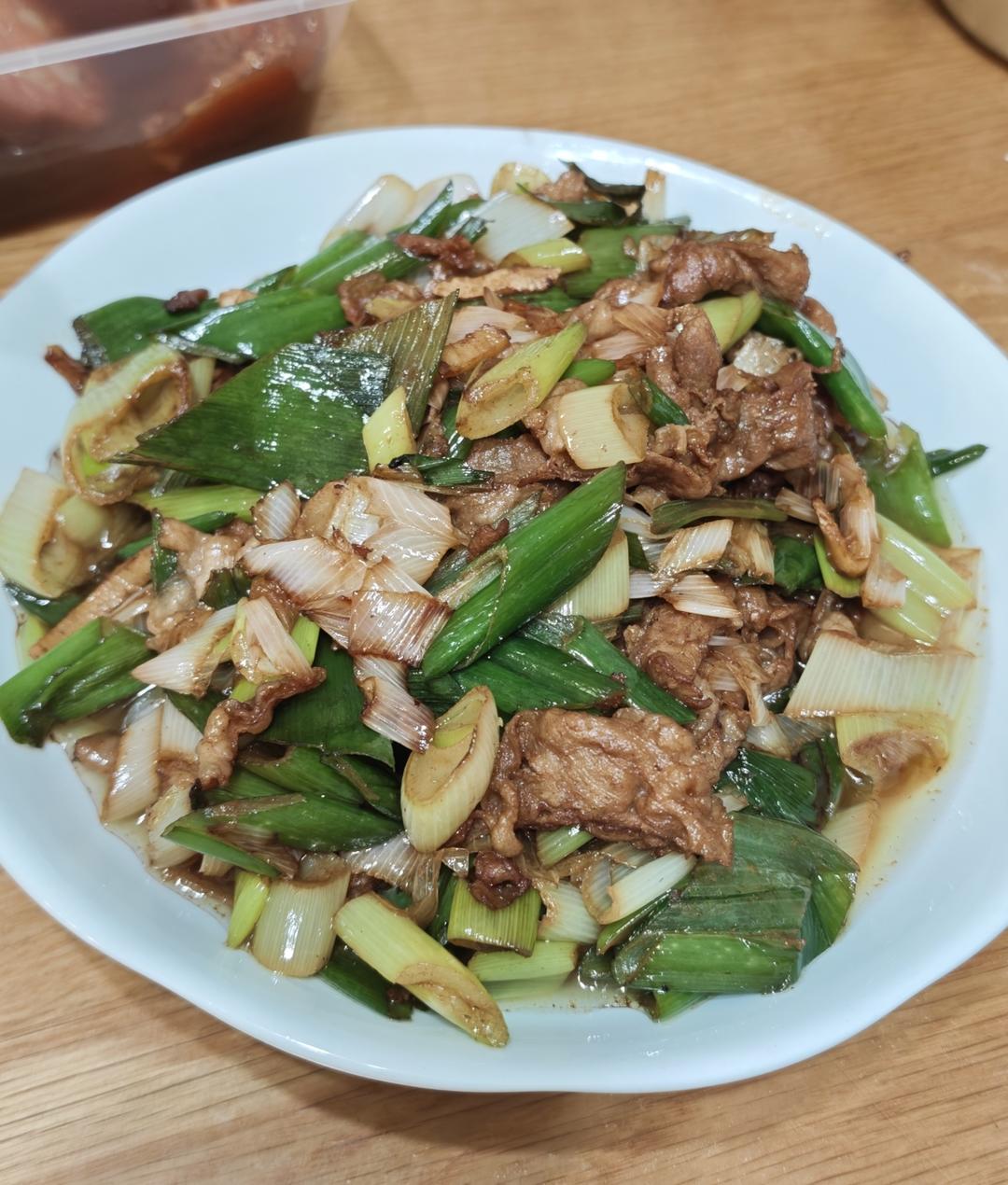 炒了20多年的葱爆羊肉