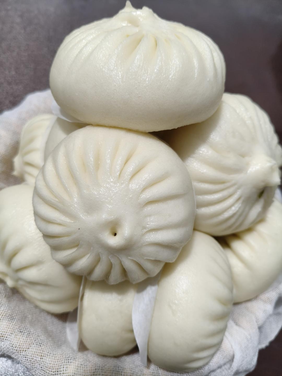 圆包子捏褶子