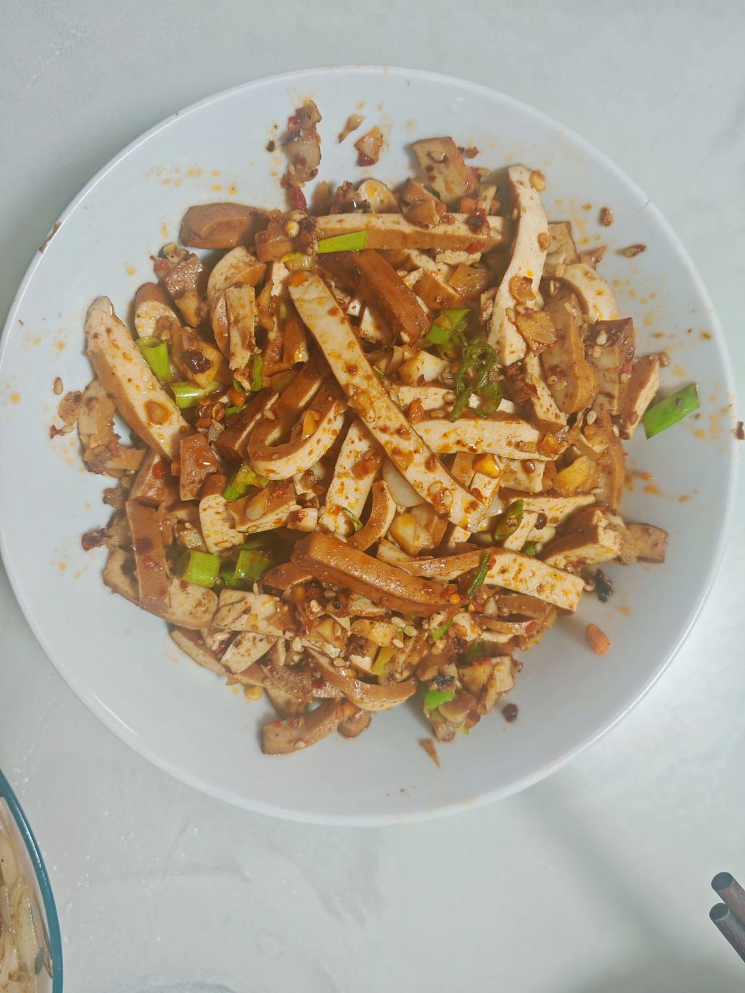 「凉拌达县牛皮豆干」