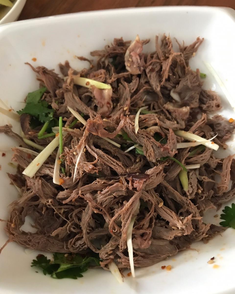 【凉拌猪心赛狗肉】