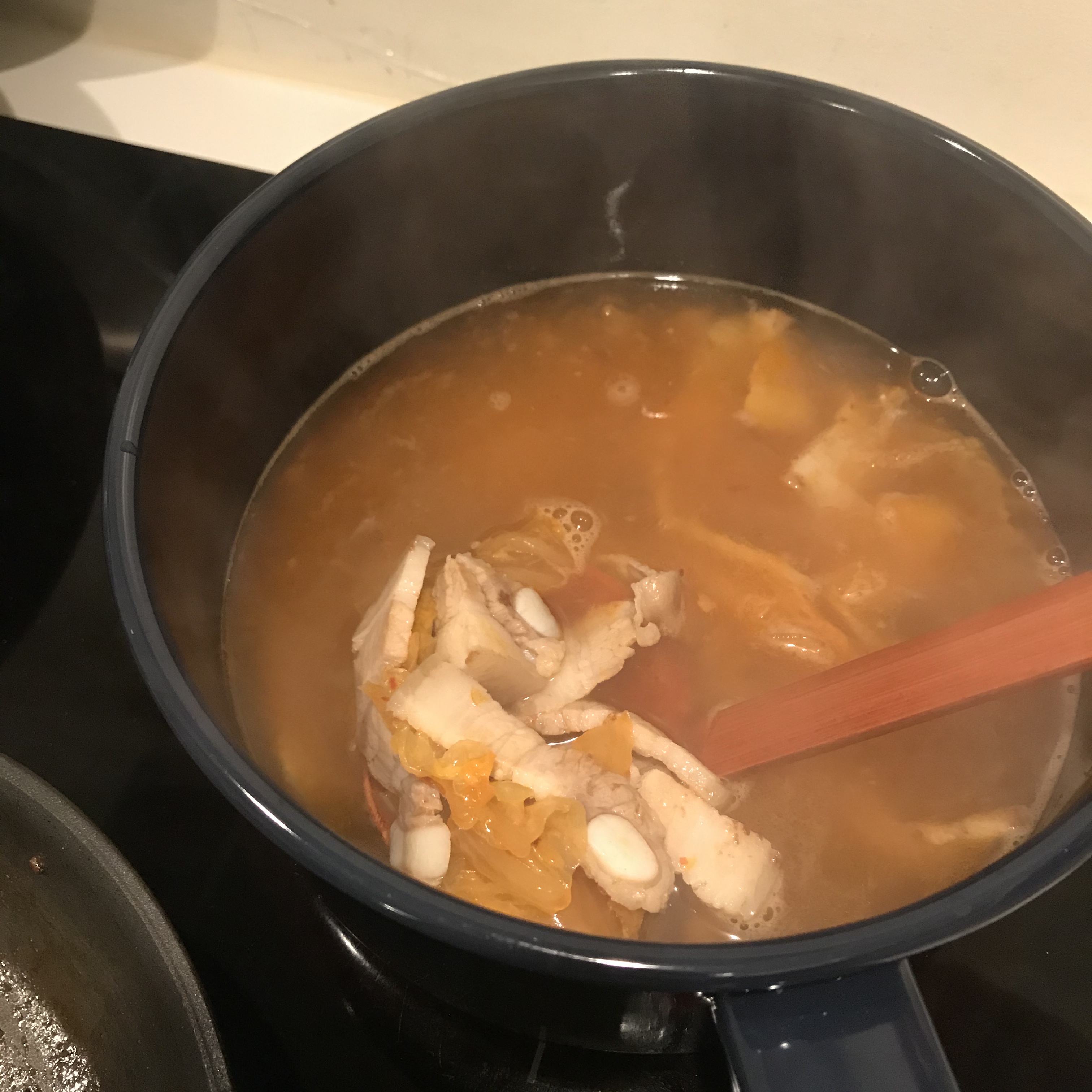 韩式五花肉泡菜豆腐锅的做法 步骤7