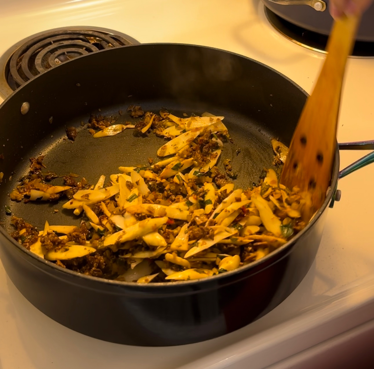 梅干菜酸菜肉末笋片的做法 步骤11