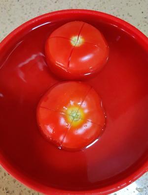 酸甜绵软的番茄鸡蛋炖豆腐的做法 步骤2