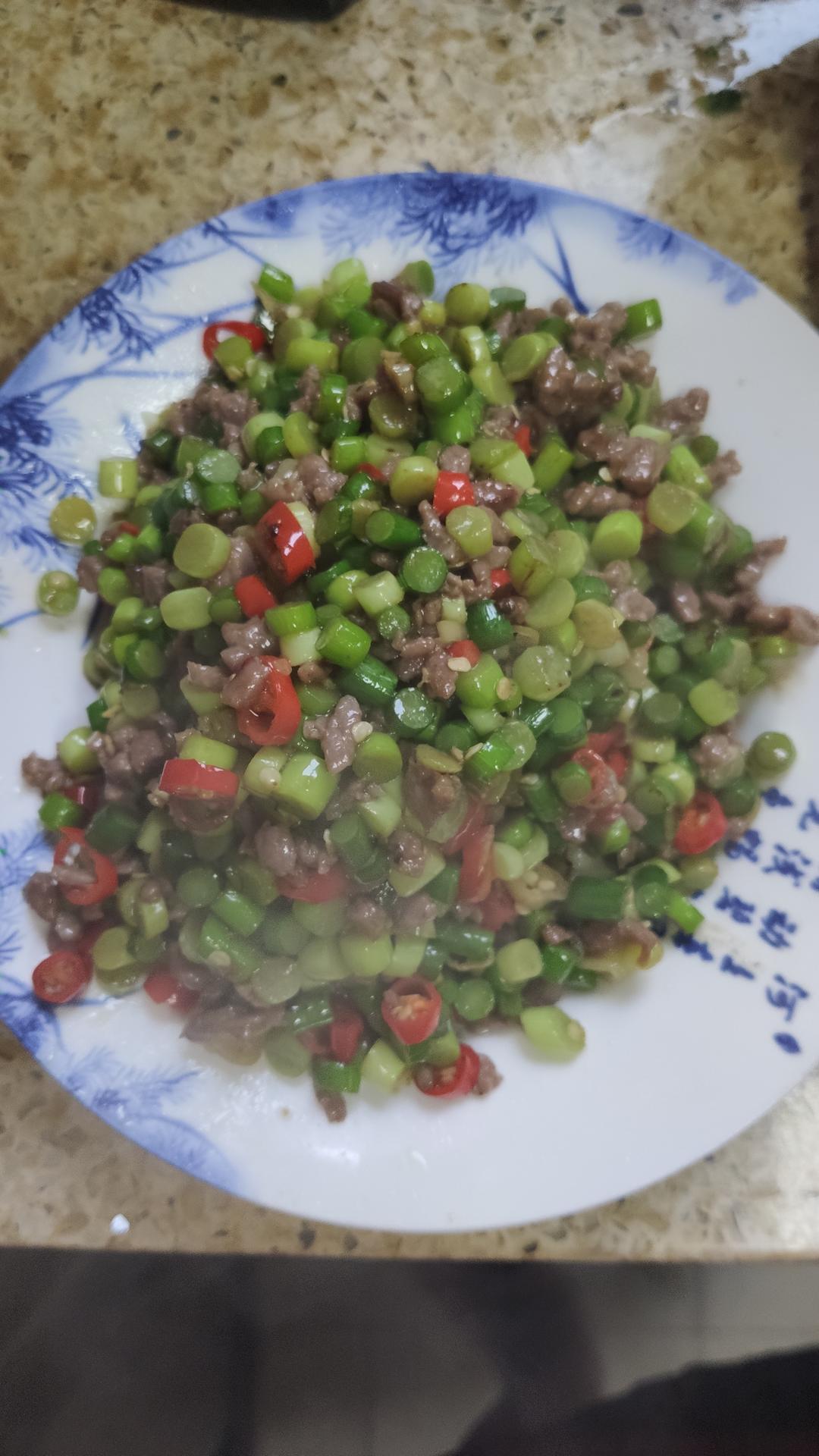 小炒黄牛肉（蒜苔版）的做法 步骤7