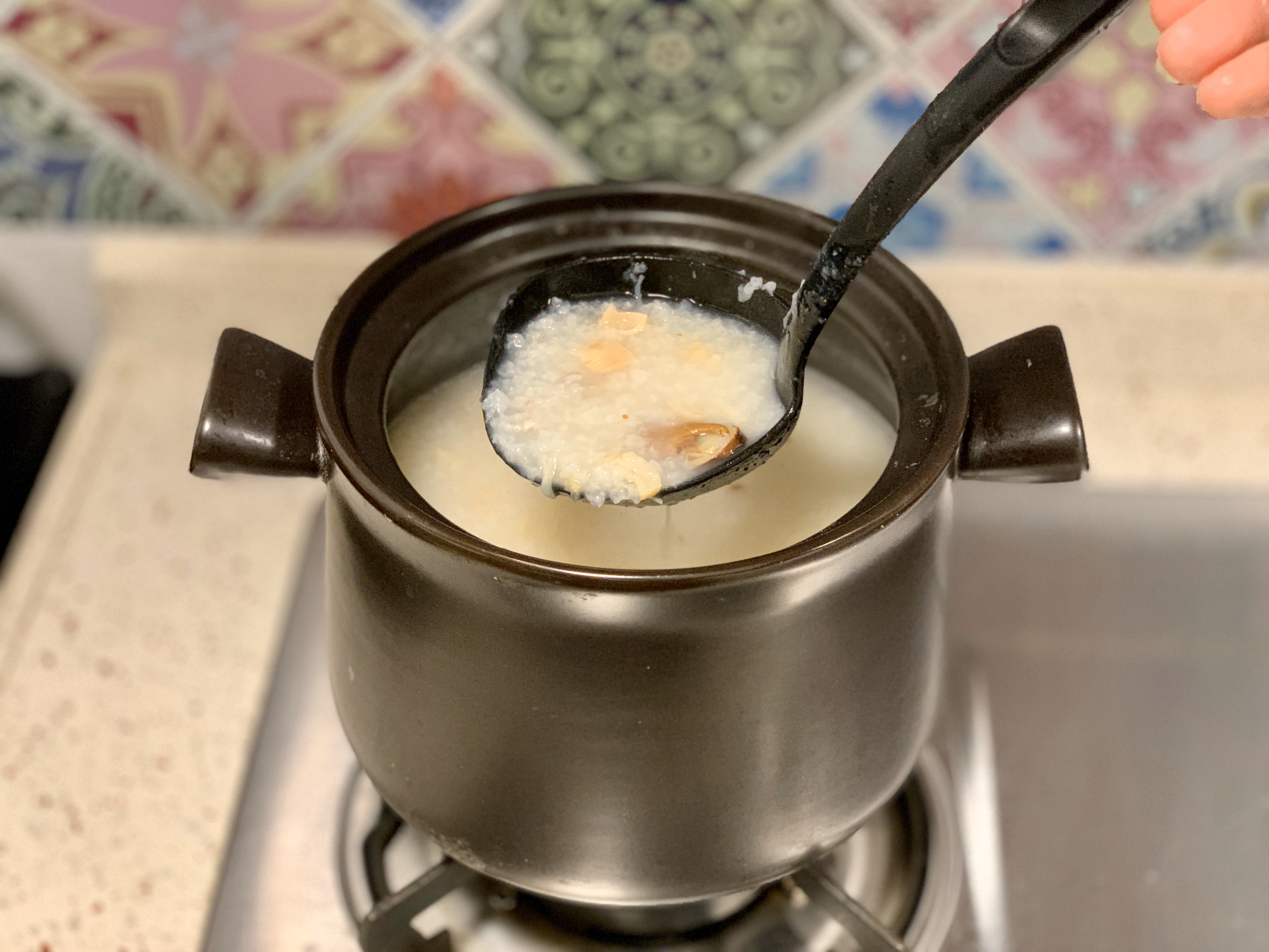 粤式·瑶柱蚝䜴瘦肉煲仔粥的做法 步骤4