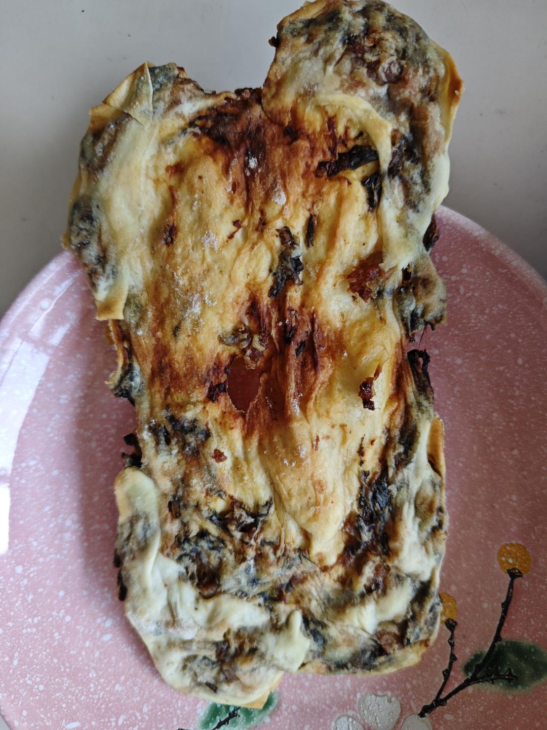 嗄嘣脆的梅干菜肉烧饼