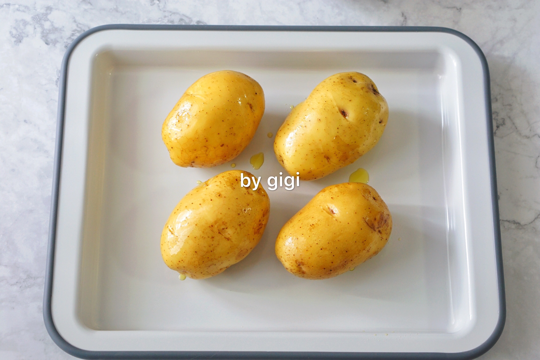 【北鼎烤箱食谱】蒜香芝士烤土豆的做法 步骤4