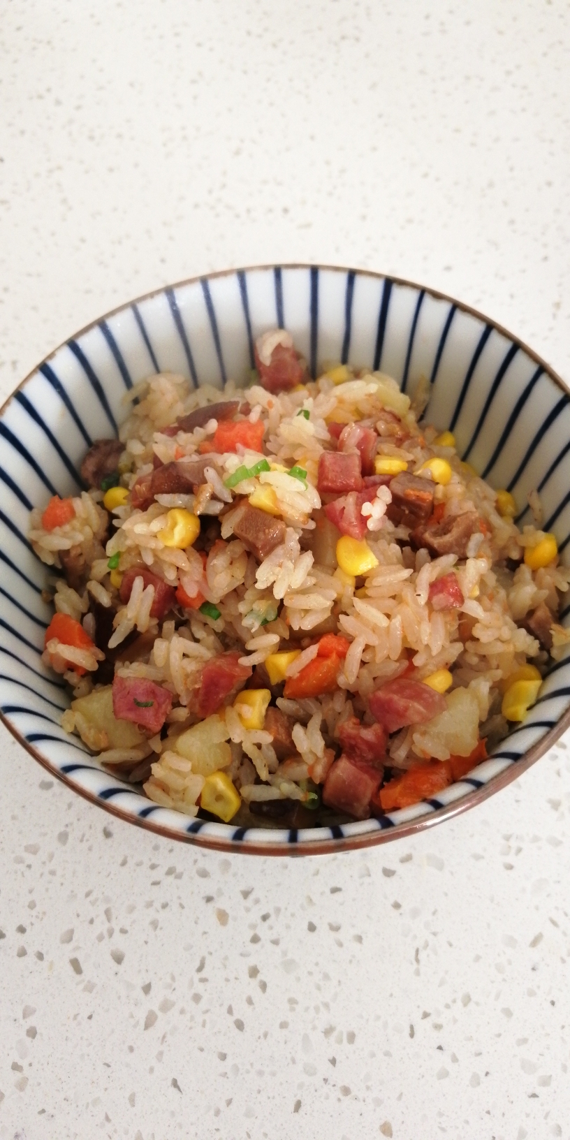 腊肠焖米饭的做法