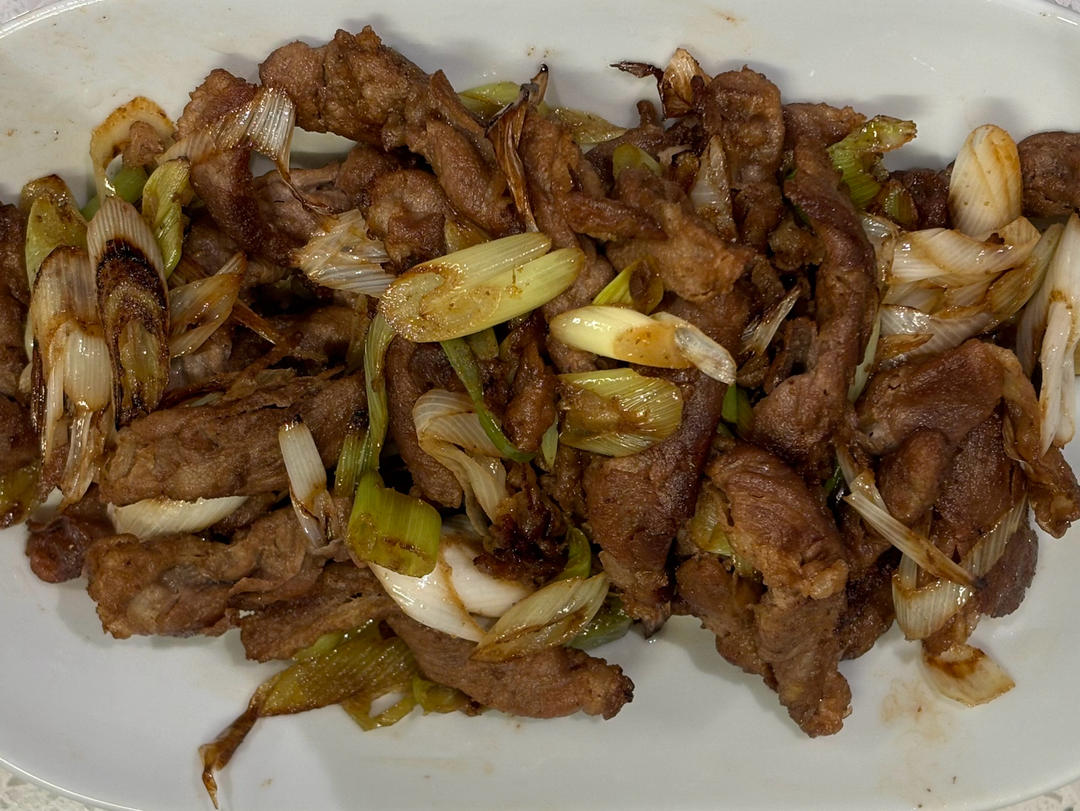 炒了20多年的葱爆羊肉