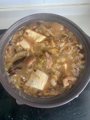 酸菜炖冻豆腐的做法 步骤4