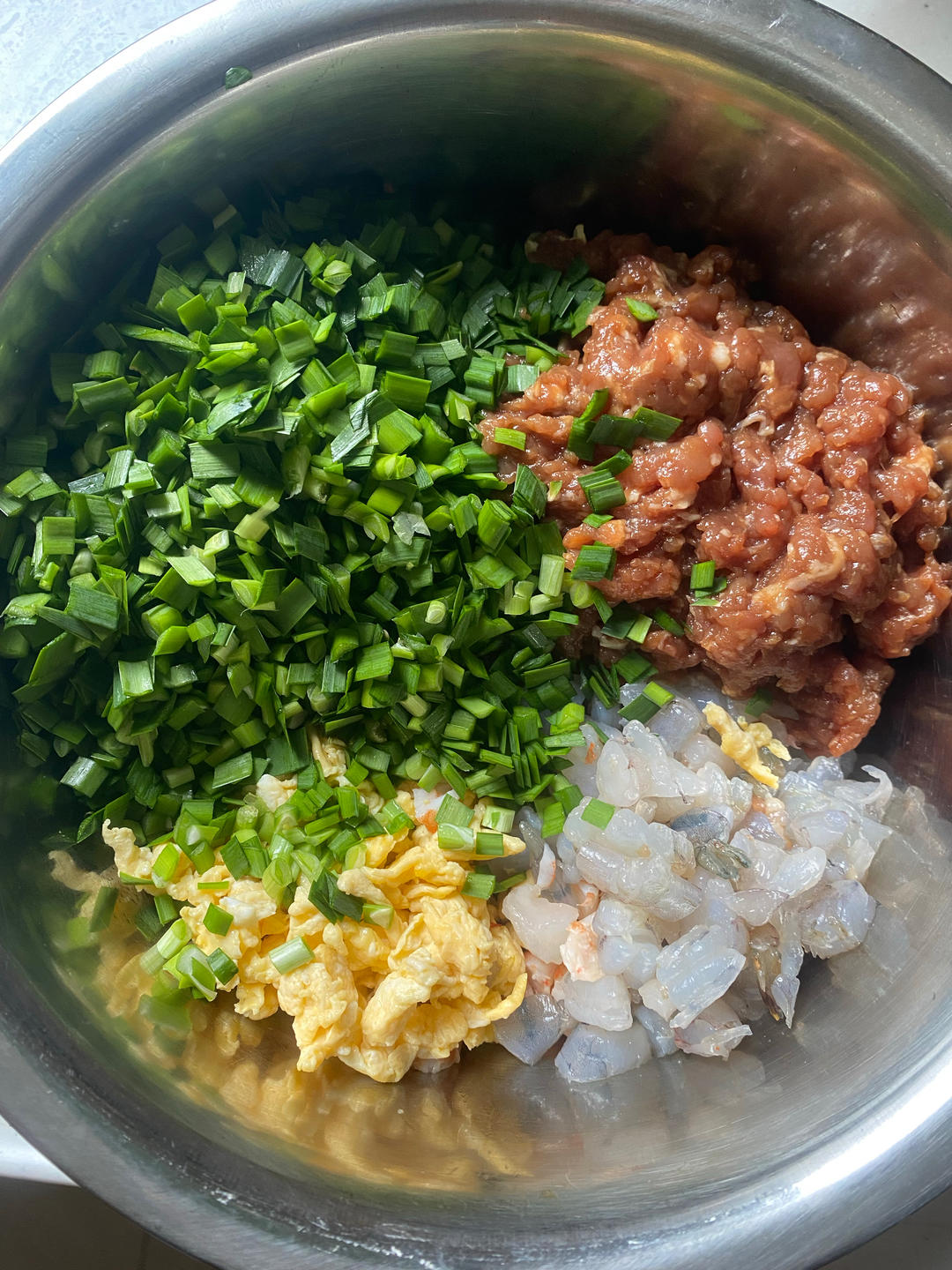荤三鲜馅儿饺子，鸡蛋虾仁韭菜三鲜馅儿