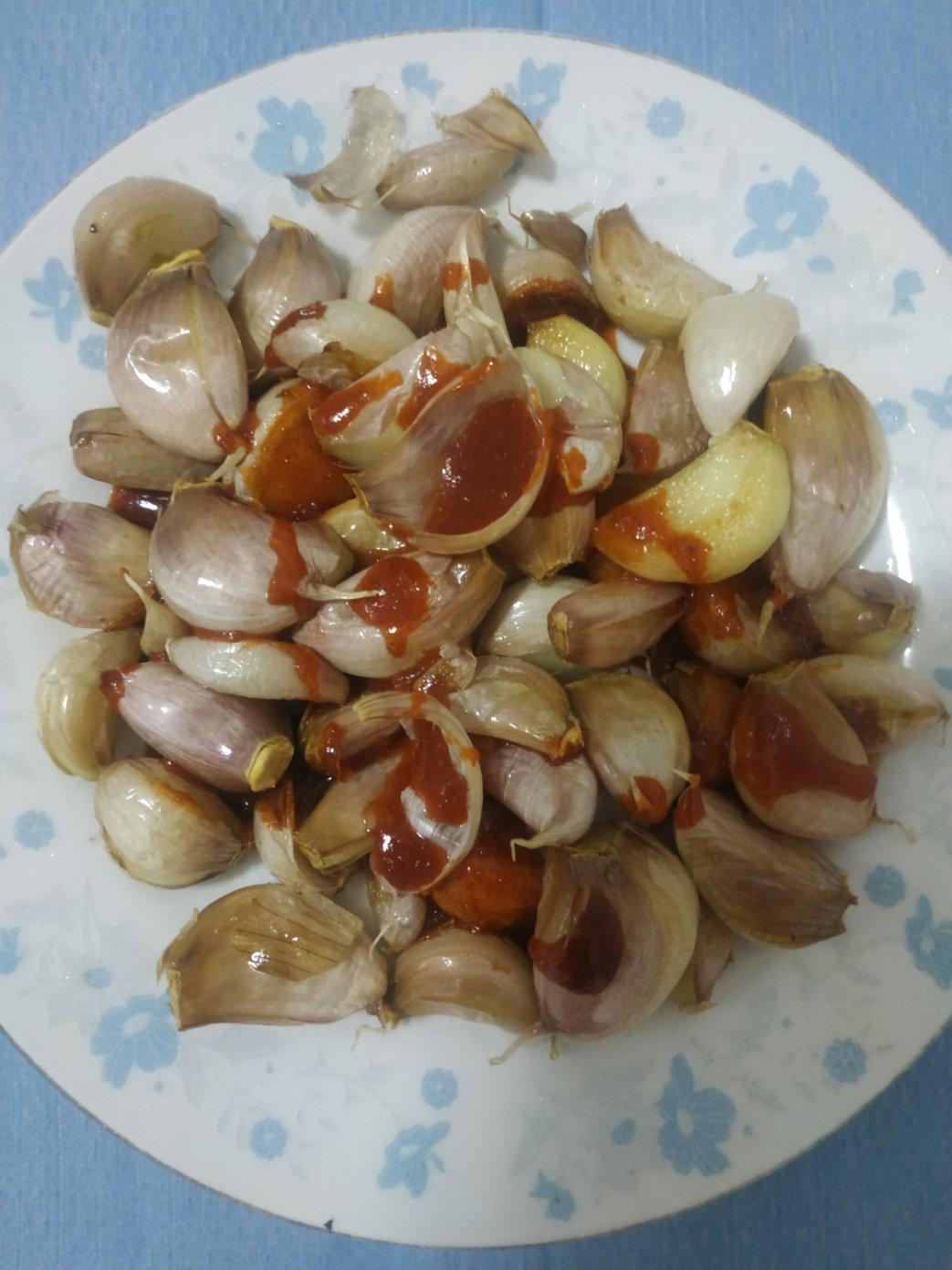 葱末蒜粒炒花甲