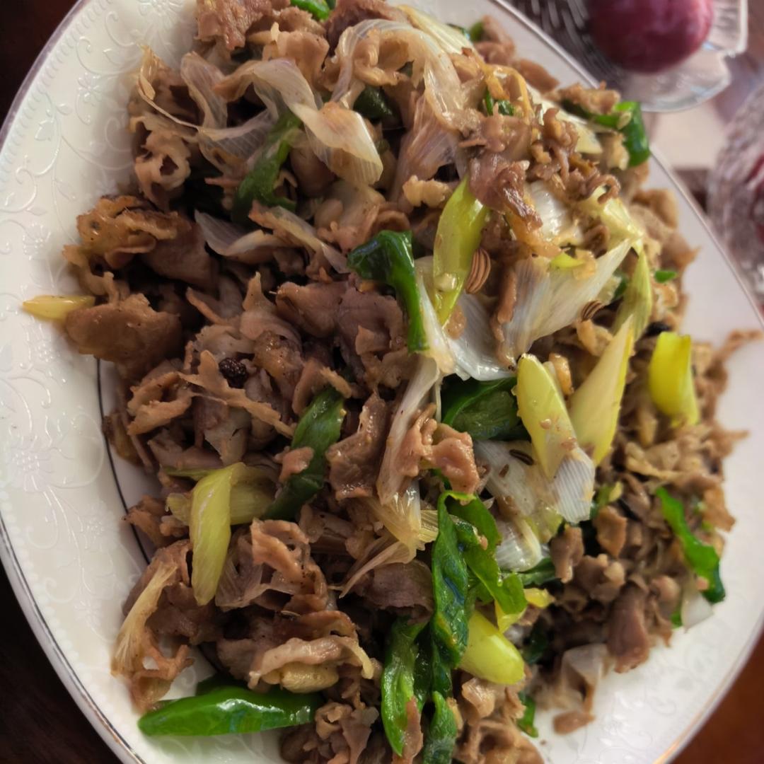 炒了20多年的葱爆羊肉