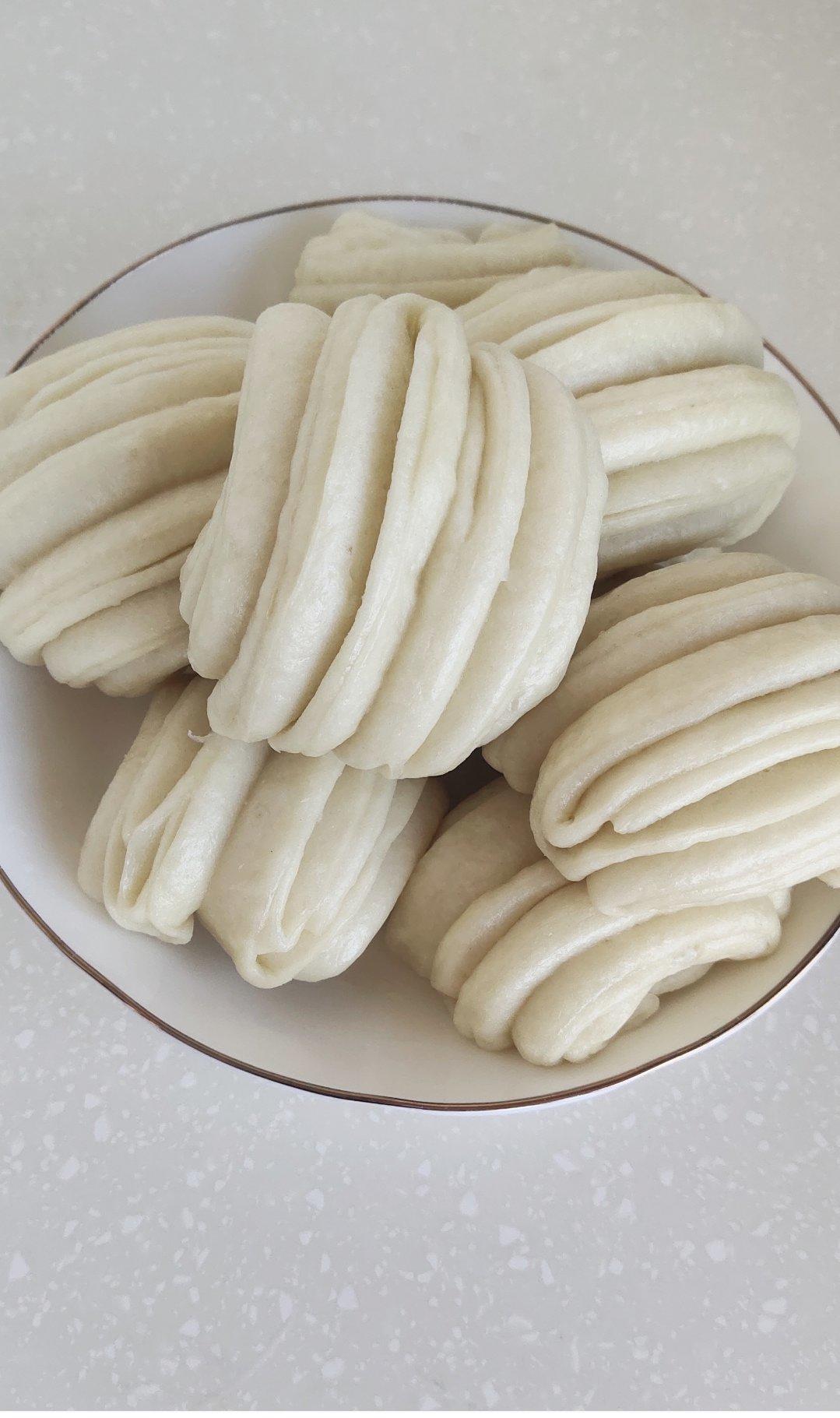 娟做的葱油花卷steamedroll