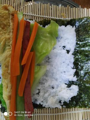 儿童营养餐:紫菜包饭的做法 步骤7