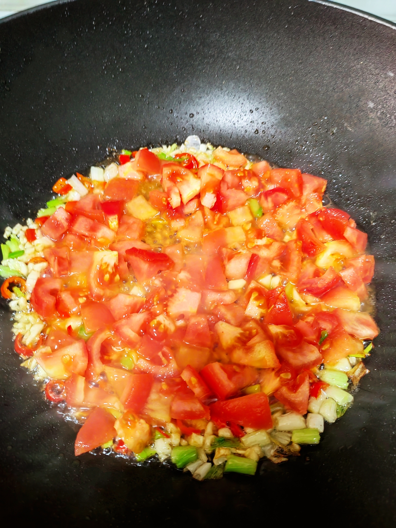 酸甜绵软的番茄鸡蛋炖豆腐的做法 步骤11