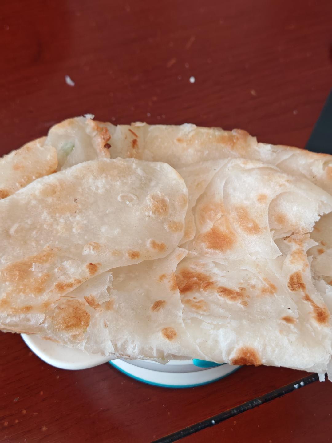 烙饼不硬的小窍门 掌握了你也能看出柔软多层凉了不硬的小油饼