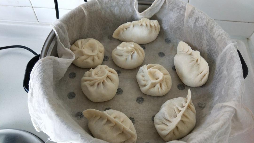 弯柳叶包子包法