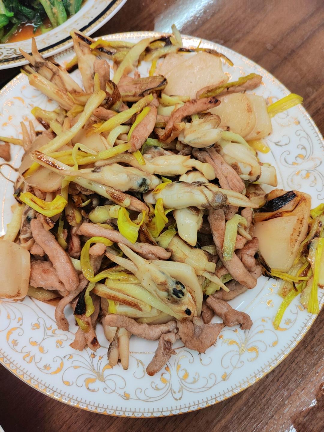 韭黄蛏子炒年糕