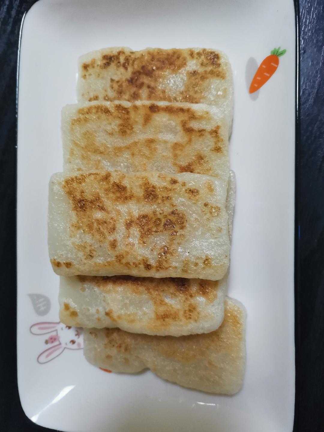 不粘锅的广式煎年糕