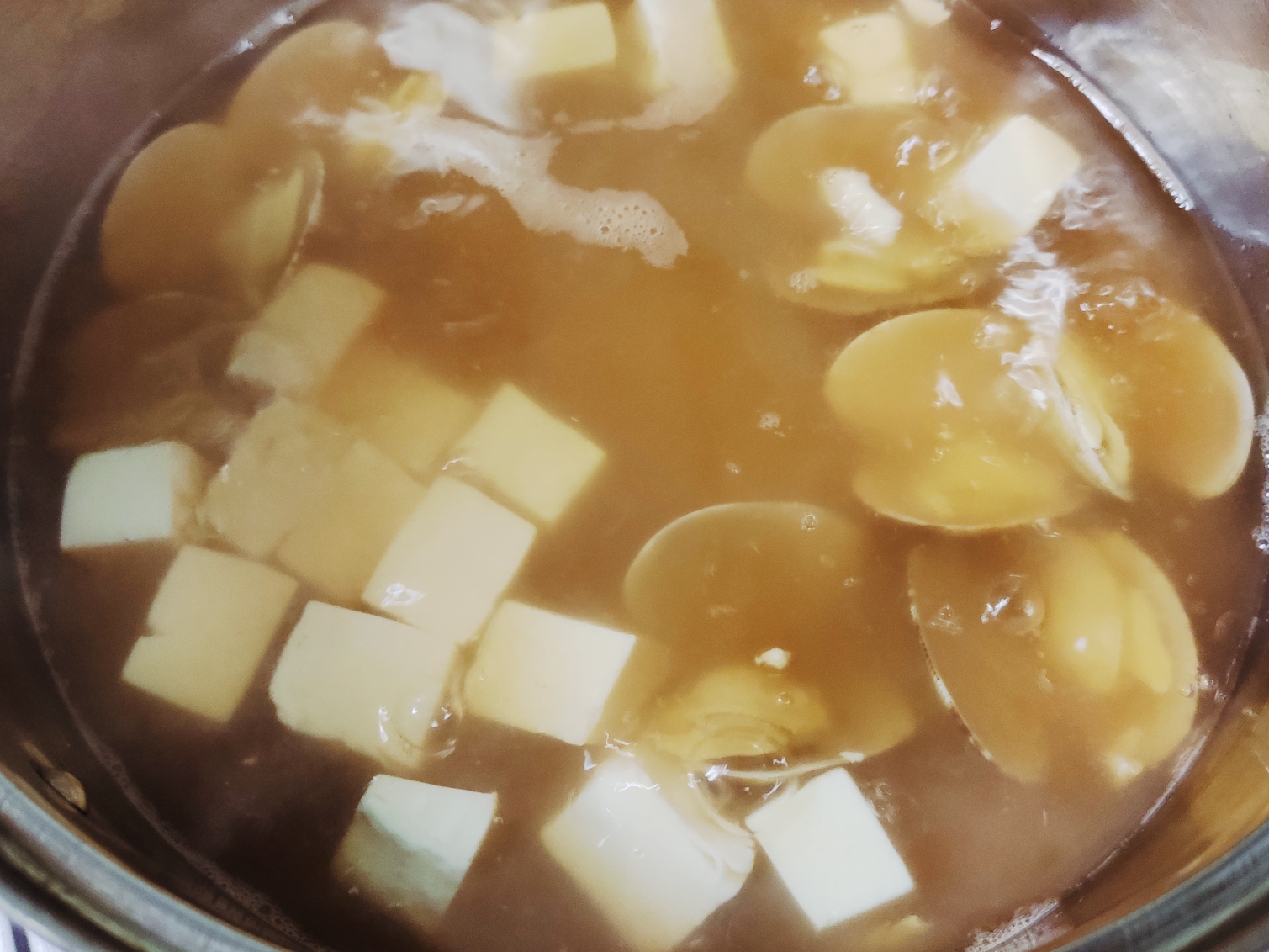 花蛤豆腐汤（番茄味）的做法 步骤5