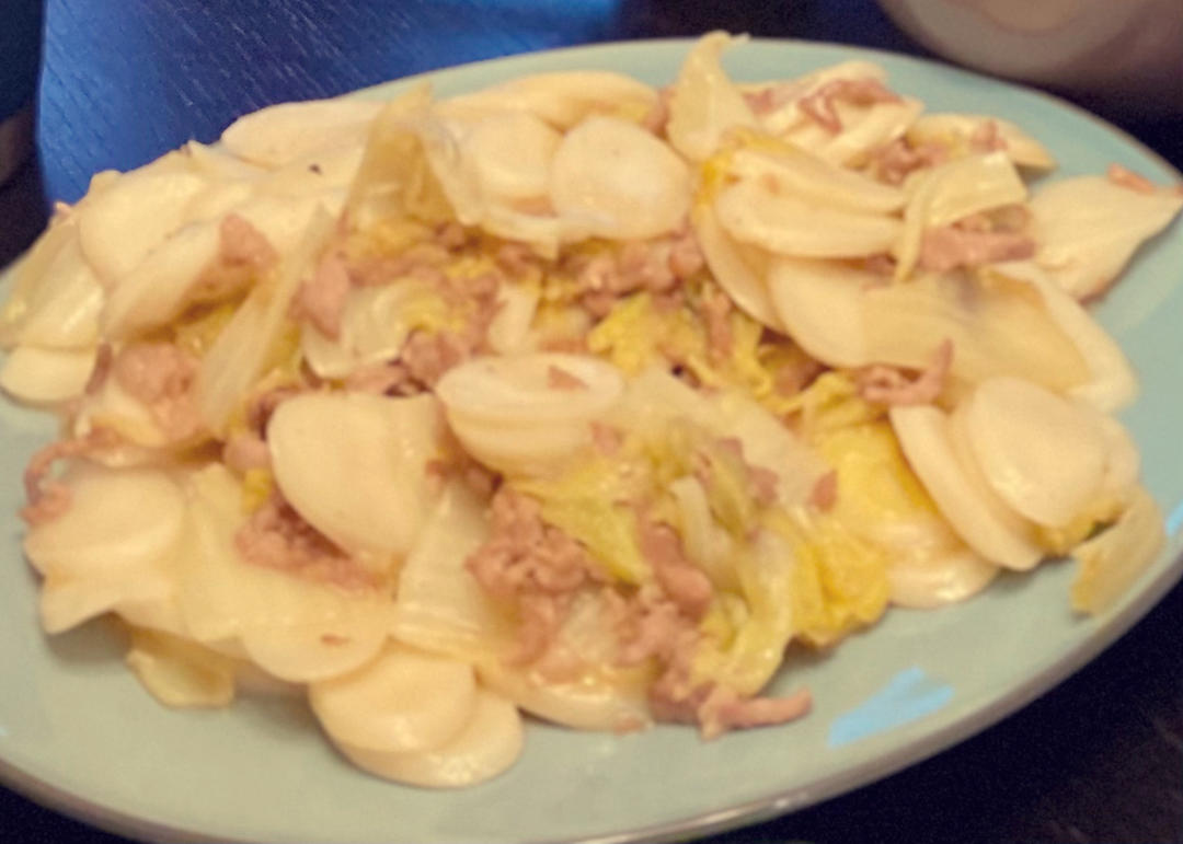 不挑锅、不焦不沾的黄芽菜肉丝炒年糕