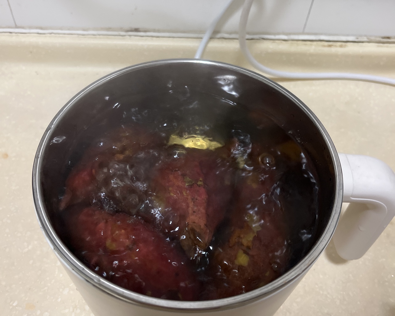 学生小电锅煮红薯的做法