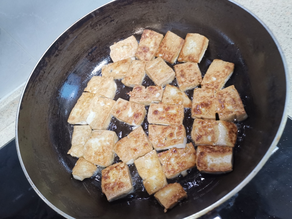 泥鳅炖豆腐的做法 步骤5
