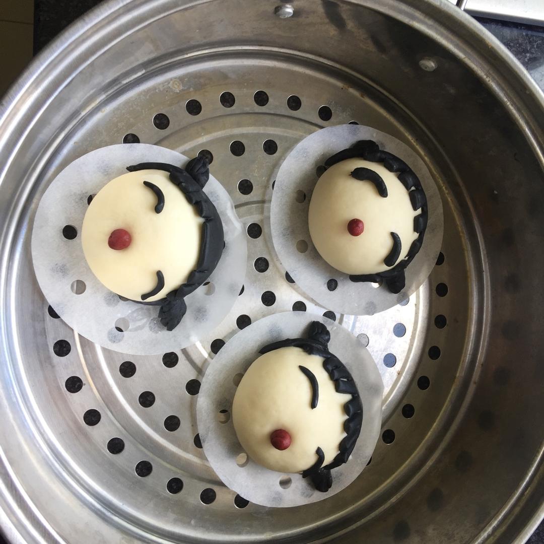 可爱中国娃娃卡通造型馒头奶黄包
