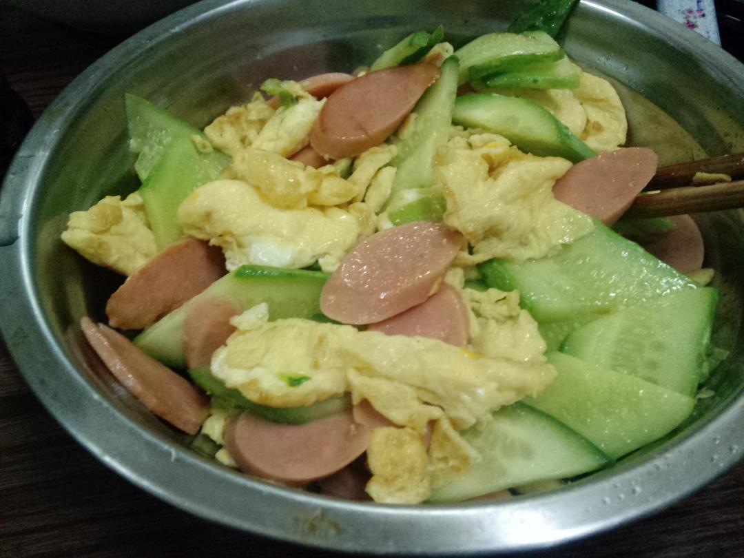 瓜片火腿炒鸡蛋的做法