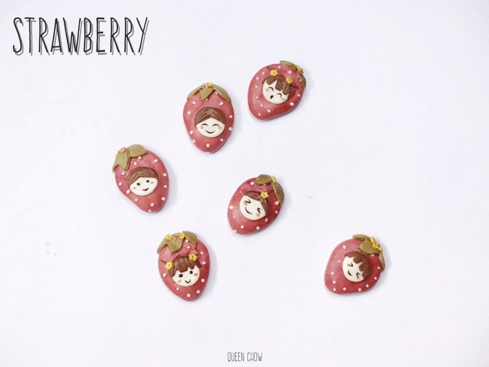 草莓娃娃表情卡通包