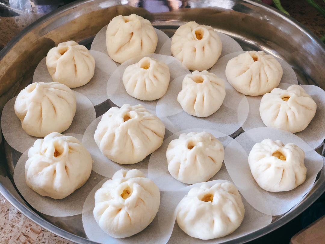喊阿明来载你做的奶香椰蓉包子